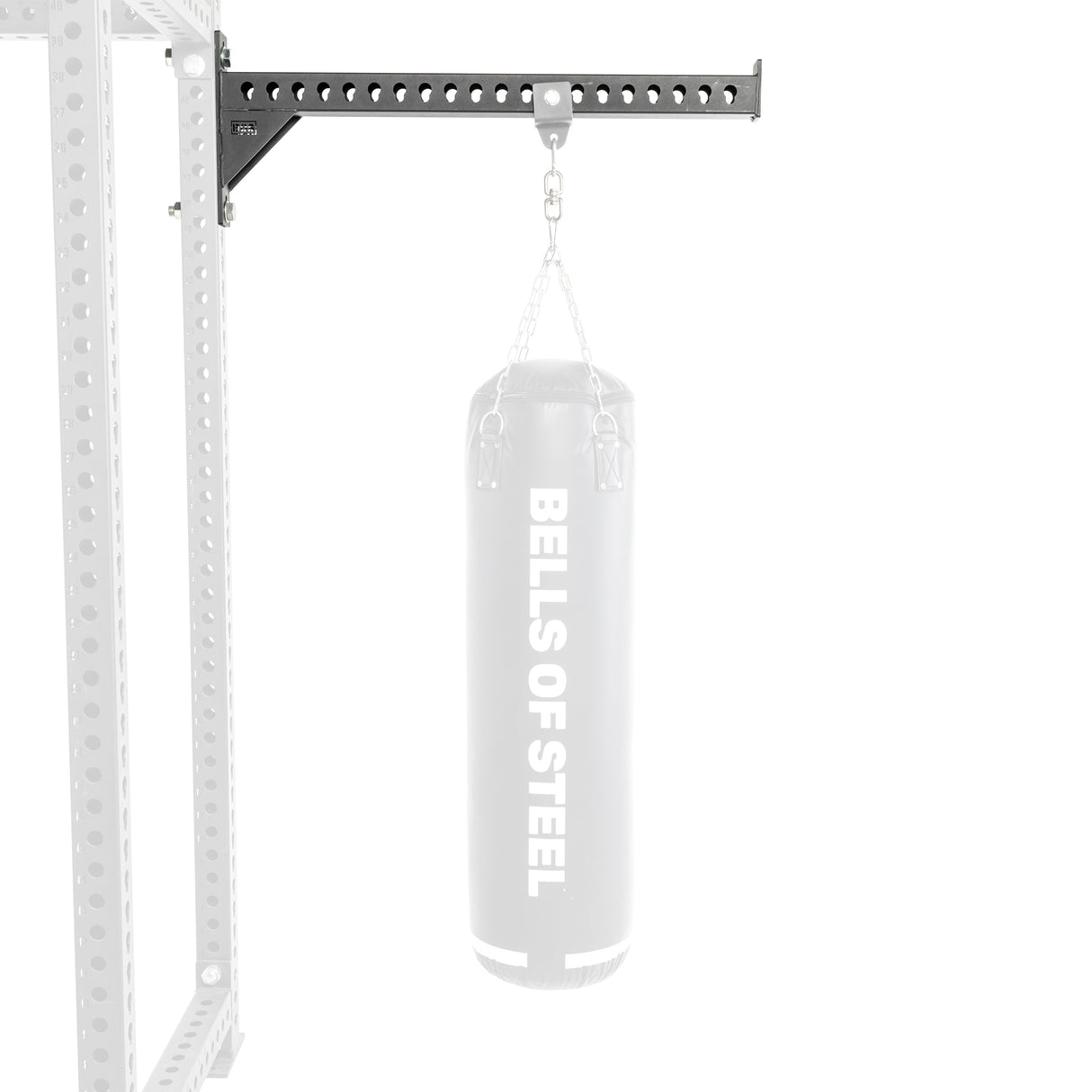 A Bells of Steel Utility Arm supports a punching bag on a power rack, merging simplicity with functionality for an efficient home gym setup.