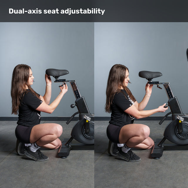 A person kneels beside the Bells of Steel Blitz Max Air Bike, showing how to adjust the seat’s height and depth. Above them, text reads “Dual-axis seat adjustability” on this premium fitness equipment.