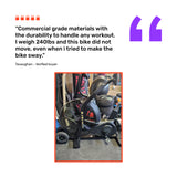 A customer review praises the Bells of Steel Blitz Max Air Bike for its sturdiness, noting it didn’t move during a workout despite weighing 240 lbs. Below is a photo of the black fan bike in a commercial gym setting.
