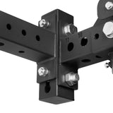 Close-up of Bells of Steel Rack Junctions - 3" x 3": black metal connectors with adjustable holes and large silver bolts, highlighting sturdy construction and numbered adjustment points—ideal for any home gym.