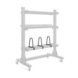 A pack of three Bells of Steel Dividers for Bumper Plate Shelf, shown on a faded rack with black U-shaped holders attached to the lower shelf.