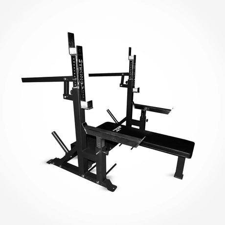 The Bells of Steel StrongArm Combo Rack is a black, heavy-duty squat stand and bench press rack with adjustable barbell supports and safety arms, shown against a plain white background.