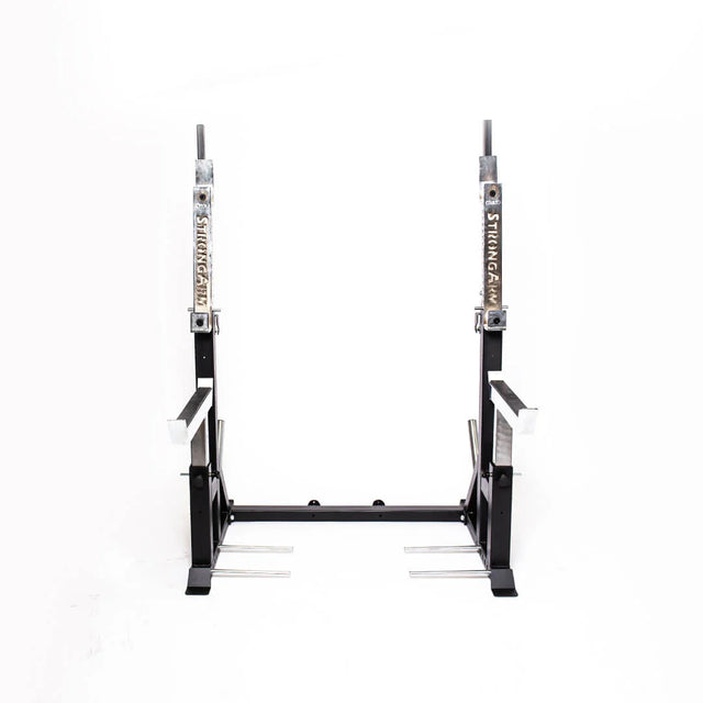 The Bells of Steel StrongArm Combo Rack is a black adjustable squat stand and bench press rack with metal supports, featuring "StrongArm" labels on the vertical bars, set against a plain white background.
