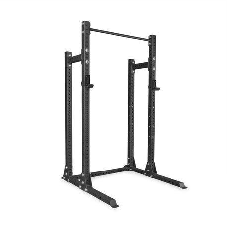 The Bells of Steel Hydra Half Rack - Prebuilt (3" x 3", ⅝" holes) features a black metal frame, adjustable holes, pull-up bar, and sturdy base—ideal for weightlifting and strength training in any home gym.