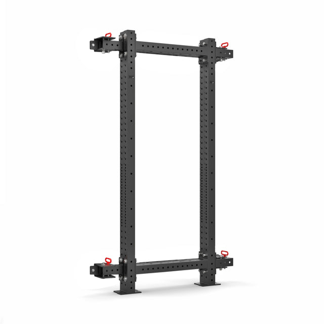 Against a plain white background, the Roc Foldable 4 Post Cage by Bells of Steel, featuring a black metal frame with adjustable hooks and prebuilt modular components, is designed for versatile fitness routines.