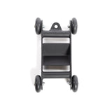 The Glute Ham Slider by Bells of Steel is a black bracket with four durable rubber wheels (two per side) and a central rectangular cutout, shown against a plain white background.