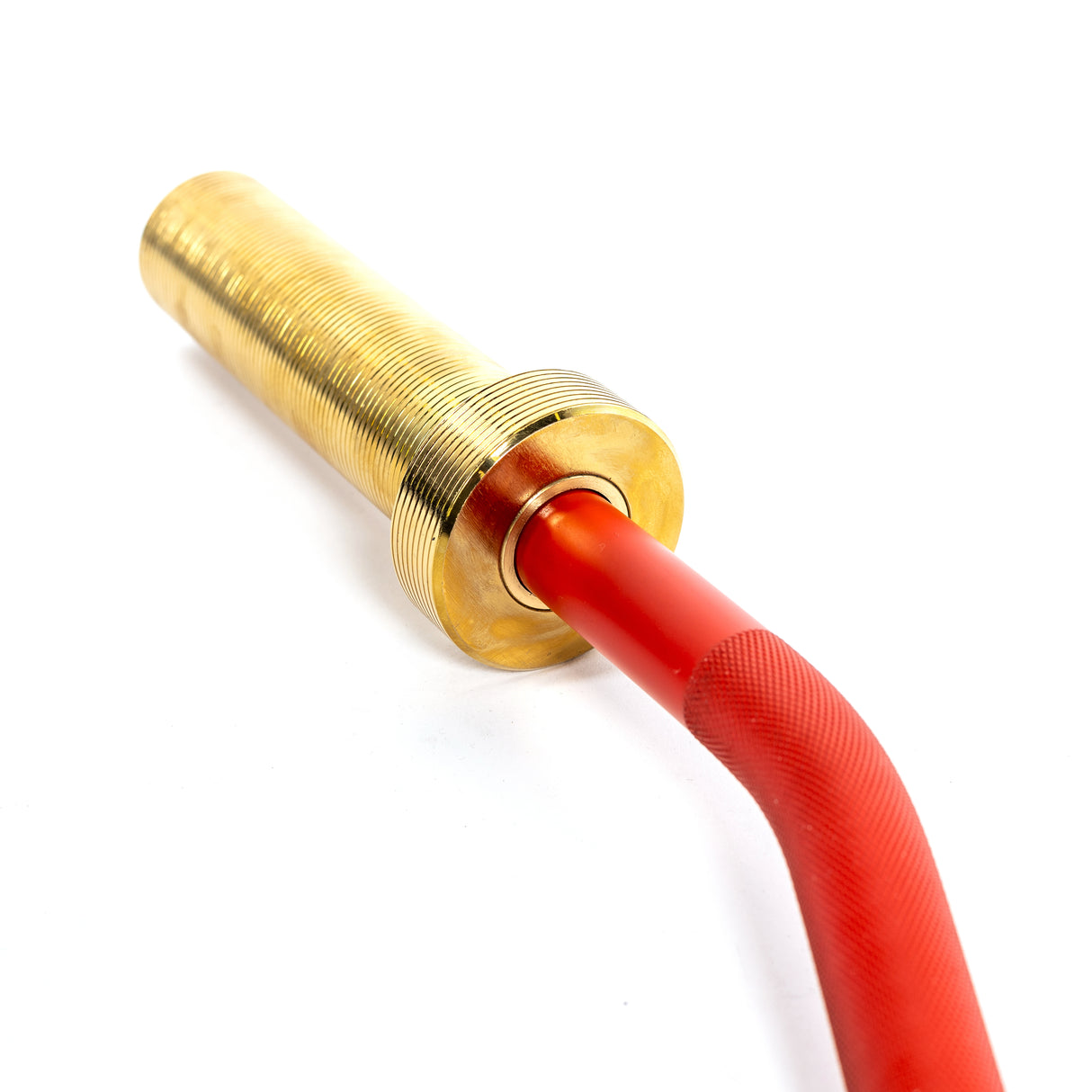 A close-up of a long, cylindrical brass bolt is attached to a textured red handle, reminiscent of the Bells of Steel 100% RAW Competition Curl Bar. The plain white background highlights the metallic texture and vibrant color.