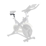 A stationary Blitz Indoor Cycling Bike is shown faded out, with the seat and a Bells of Steel Tall Cycling Bike Seat Post highlighted in full color to emphasize the extender’s position and function.