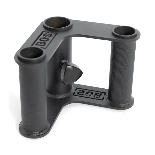 The Fat Bar - T-Bar Row Cable Attachment by Bells of Steel is a black metal stand with a triangular base, three cylindrical holders, and a central knob for cable attachment. The "BOS" letters enhance grip strength with their embossed matte finish.