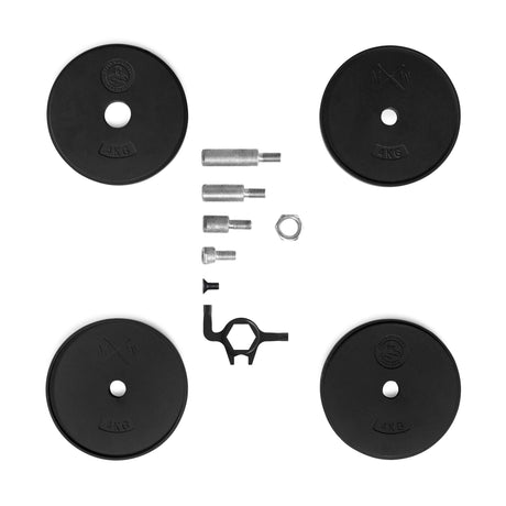 Four black 2 kg weight plates, four metal barbell parts, a nut, and a tool from the Bells of Steel Mark Wildman Adjustable Kettlebell are arranged on a white background, with weights in each corner and hardware centered.